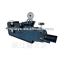 MELT ADHESIVE SPURTING AND SILICONE PAPER STICKING MACHINE